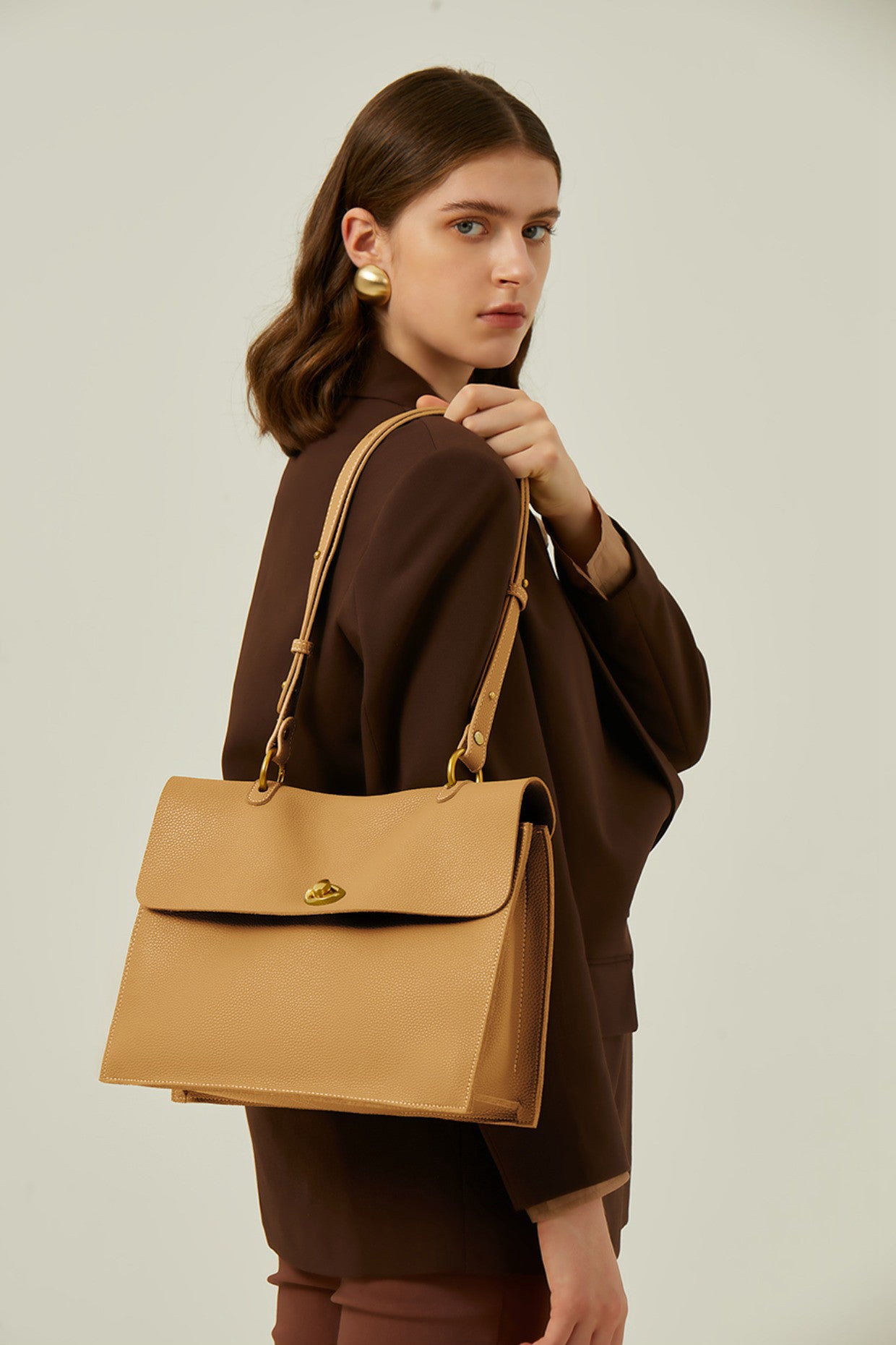 light brown messenger bag